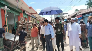 লালমোহনে ফুটপাত দখলমুক্ত করতে উচ্ছেদ অভিযান