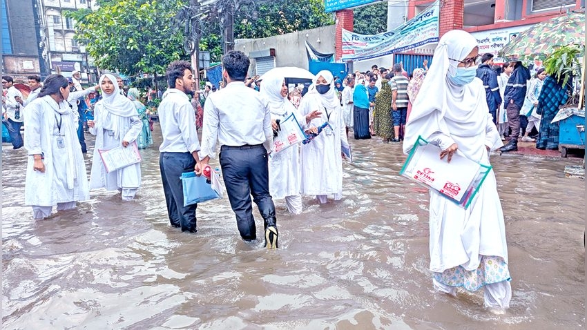 HSC candidates navigate floodwaters to reach exam centres